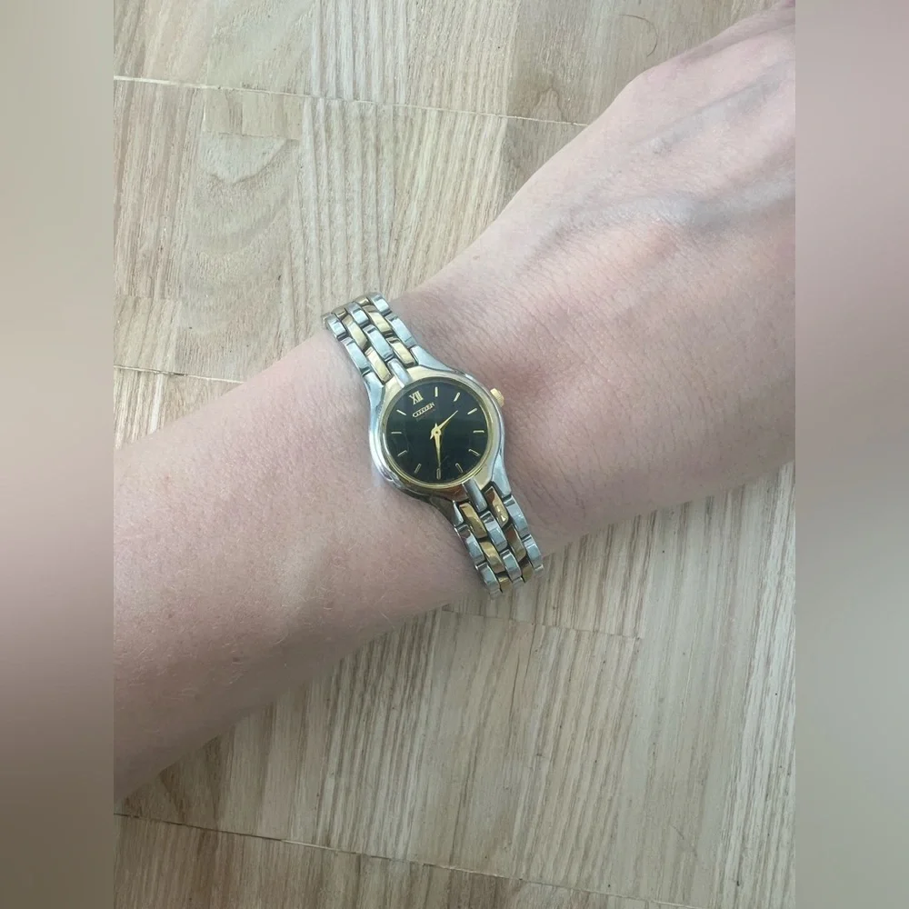 Citizen eco-drive ladies black dial two toned solar dress watch
